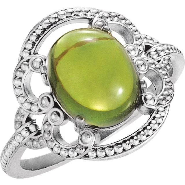 Ladies rings sci-fi theme -14KT GOLD 2.50 CTW OVAL PERIDOT GRANULATED DESIGN RING