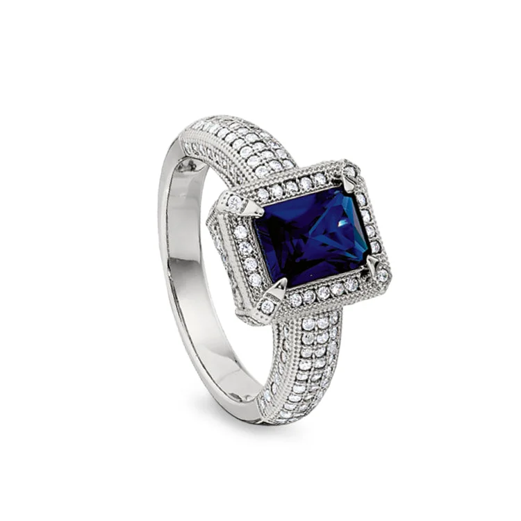 Ladies rings minimalist design -Platinum Finish Sterling Silver Micropave Emerald Cut Synthetic Blue Sapphire Ring with Simulated Diamonds