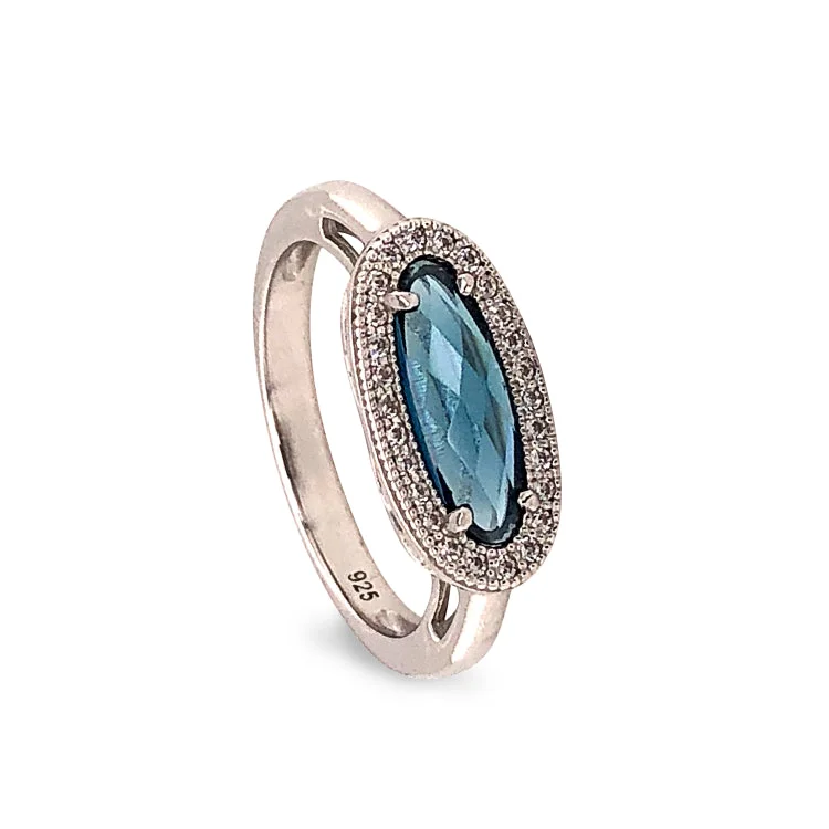 Ladies rings pharaoh design -Platinum Finish Sterling Silver Micropave Oblong Ring with Simulated London Blue Topaz and Simulated Diamonds