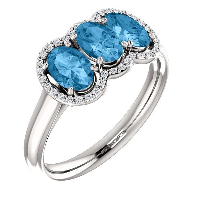 Ladies rings discount offer -14KT GOLD 1.74 CTW BLUE TOPAZ & .10 CTW DIAMOND 3 STONE OVAL HALO RING