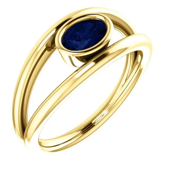 Ladies rings yoga inspired -14KT GOLD 0.70 CARAT OVAL BEZEL SET SAPPHIRE RING