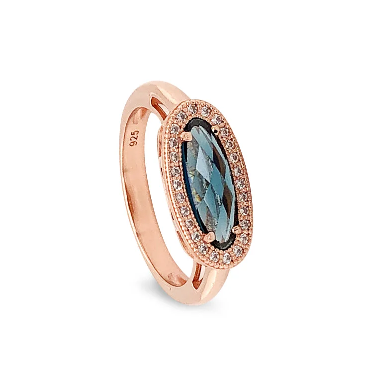 Ladies rings adventure vibe -Rose Gold Finish Sterling Silver Micropave Oblong Ring with Simulated London Blue Topaz and Simulated Diamonds