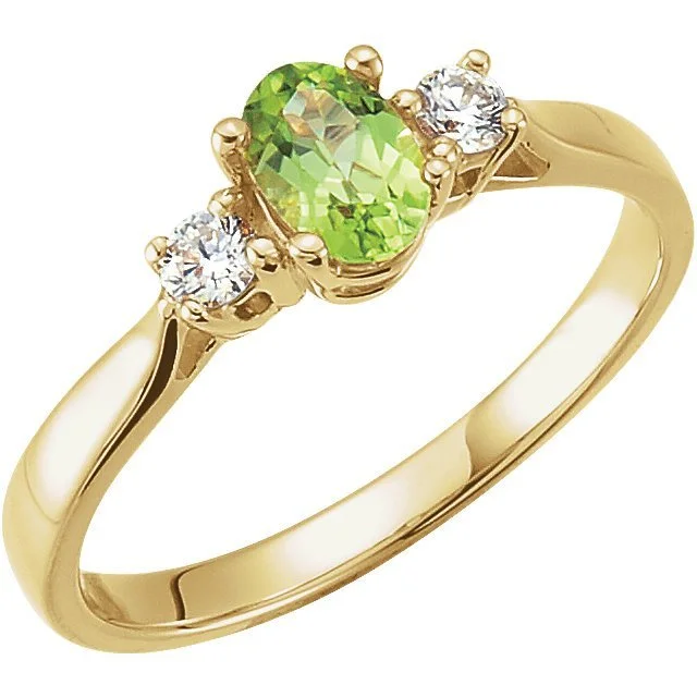 Ladies rings 1990s minimalist -14KT YELLOW GOLD PERIDOT AND DIAMOND 3 STONE RING